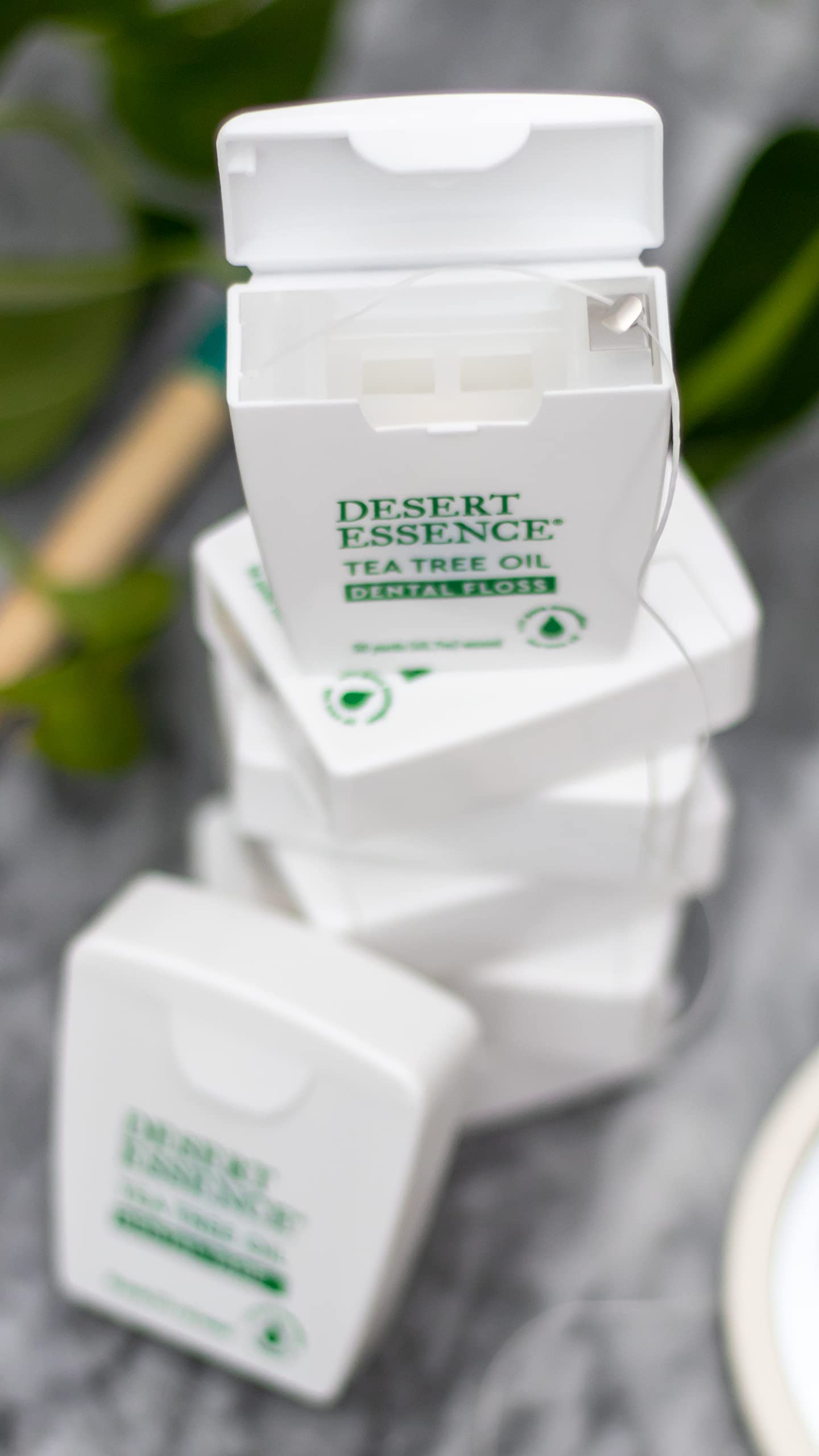 Desert Essence Tea Tree Oil Dental Floss - 50 Yards - Naturally Waxed w/ Beeswax - Thick Flossing No Shred Tape - On The Go - Removes Food Debris Buildup - Cruelty-Free Antiseptic