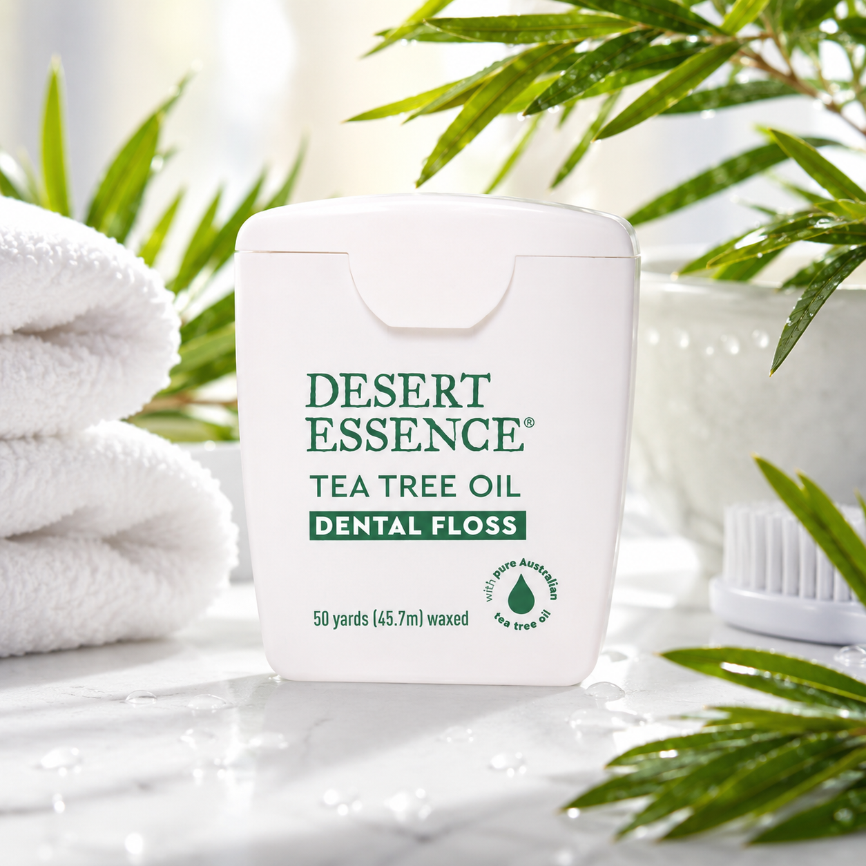 Desert Essence Tea Tree Oil Dental Floss - 50 Yards - Naturally Waxed w/ Beeswax - Thick Flossing No Shred Tape - On The Go - Removes Food Debris Buildup - Cruelty-Free Antiseptic