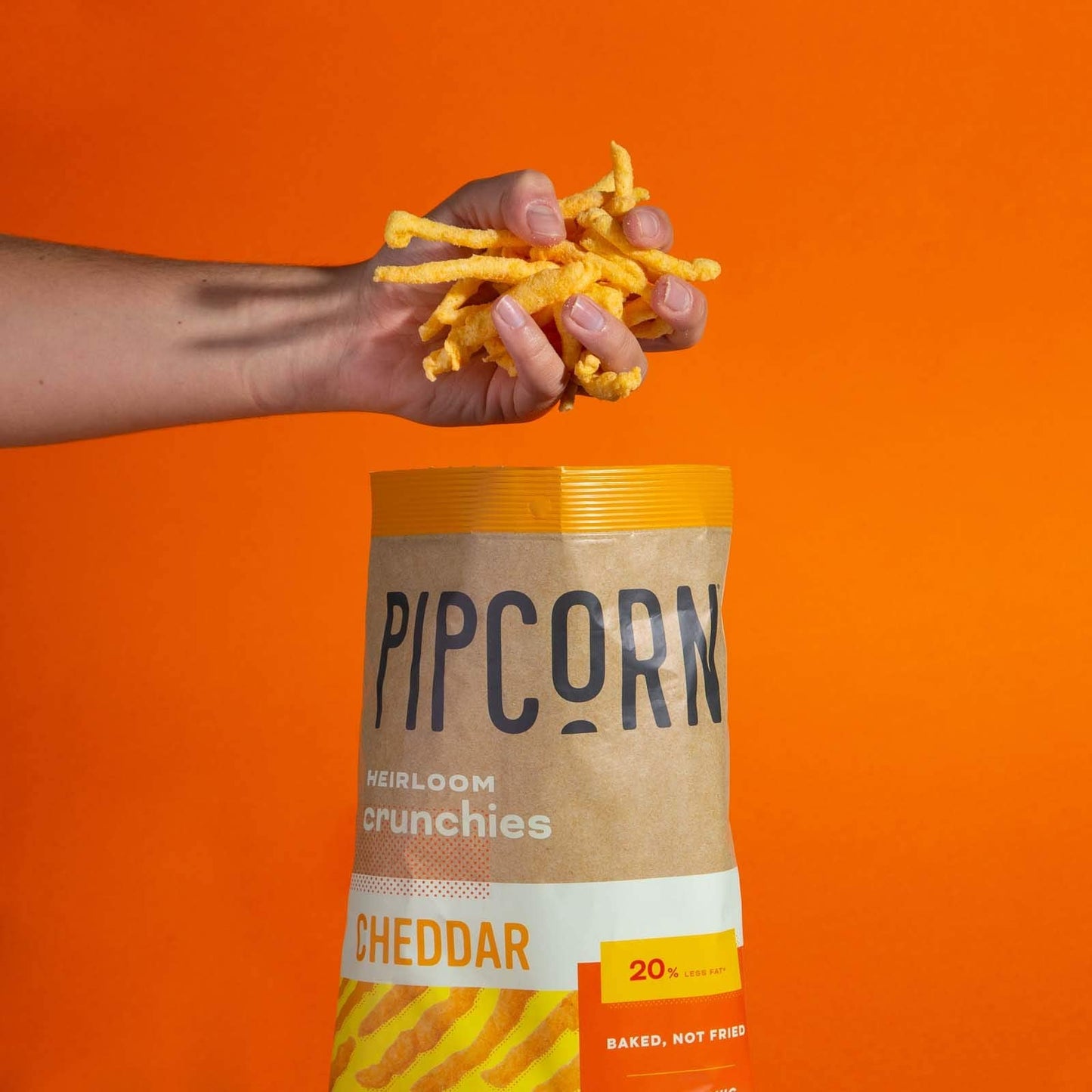 Product image of Pipcorn Heirloom Crunchies Cheddar Bags Baked Cheese Snack Organic Non-GMO Heirloom Corn No Artificial