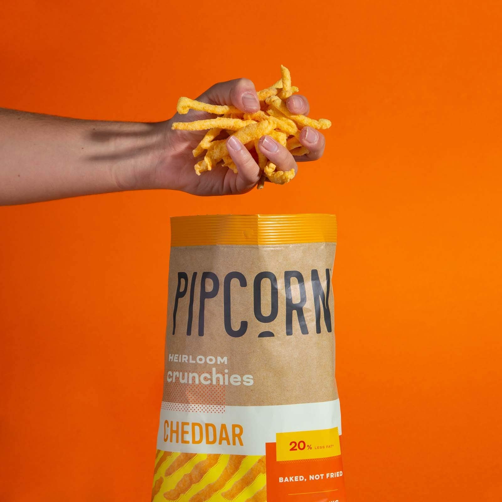 Product image of Pipcorn Heirloom Crunchies Cheddar Bags Baked Cheese Snack Organic Non-GMO Heirloom Corn No Artificial